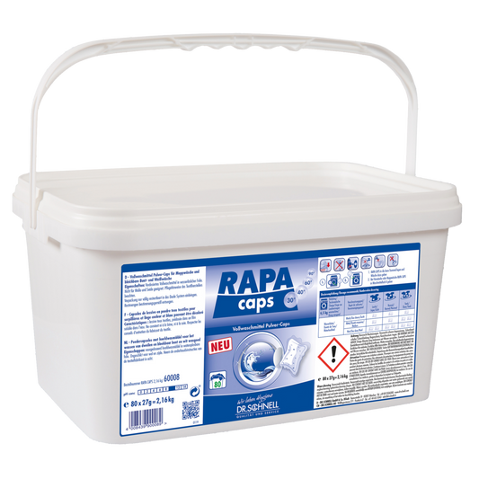 Eine weiße Kunststoffdose mit der Aufschrift "Dr. Schnell RAPA CAPS Vollwaschmittelpulver, manuelle Dosierung, Wäschehygiene" (2160 g) der DR.SCHNELL GmbH & Co. KGaA verfügt über einen Griff, einen blau-weißen Aufkleber, Sicherheitssymbole und eine Anleitung.