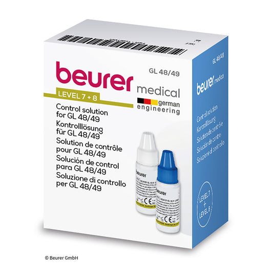 Ein Karton mit der Aufschrift "beurer medical" enthält Auslaufartikel: Beurer Kontrolllösung für GL 48/49 der Firma Beurer GmbH. Auf der Verpackung sind zwei kleine Flaschen (weißer und blauer Verschluss) abgebildet. Mehrsprachiger Text ist vorhanden.