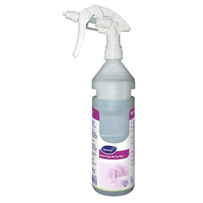 Egy átlátszó Room Care R9 Plus Pur-Eco szórópalack műanyagból, üres, a Diversey Deutschland GmbH & Co. OHG-tól, fehér szórófejjel és lila akcentusú címkével, környezetbarát tisztítószerekhez tervezve.