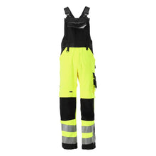 MASCOT® Newcastle dungarees, hi-vis sárga/fekete