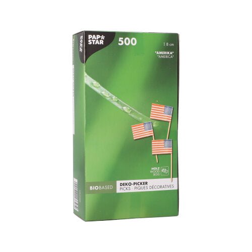 Egy fehér doboz a „PAPSTAR 500 Deko-Picker 8 cm fehér” felirattal a PAPSTAR GmbH-tól környezetbarát pálcikákat tartalmaz stílusos bemutatókhoz, termékinformációkkal és a pálcikák több nyelvű fotójával.