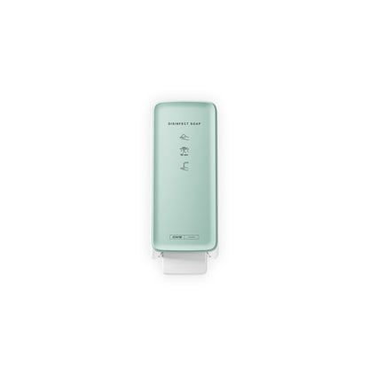 Egy falra szerelt, mentazöld CWS PureLine előlapi panel a Disinfect Foam/NT adagolóhoz "DISINFECT SOAP" felirattal, illusztrált utasításokkal és elegáns dizájnnal egy fehér háttér előtt.