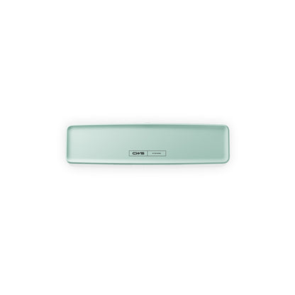 Egy téglalap alakú, világoszöld készülék, lekerekített élekkel és egy középen elhelyezett címkével, amelyen a „CWS PureLine Frontpanel für PureLine Air Bar” felirat olvasható, fehér háttér előtt látható.