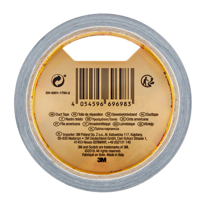 Eine Rolle Scotch® Universal Klebeband 2904 (10 m x 48 mm) der 3M Deutschland GmbH in der Draufsicht mit Barcode, Produktangaben und Übersetzungen für "duct tape" auf dem inneren Pappkern.