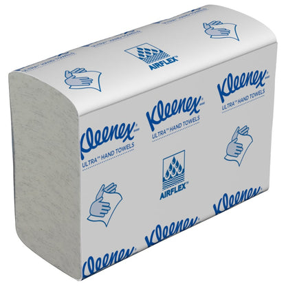 Egy halom Kimberly-Clark GmbH Kleenex® Ultra™ MultiFold kéztörlő fehér színben, 18 csomag x 150 lap dobozonként (18 csomag), kiváló minőségű papírtörlők minden mosdó számára.