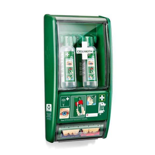 Die Orkla Wound Care AB Cederroth Augenspülstation besteht aus zwei 500-ml-Flaschen (725200) und einem Salvequick Pflasterspender (490700), die alle hinter einer durchsichtigen Abdeckung an der Wand befestigt sind, auf der die Gebrauchsanweisung und der Markenname sichtbar sind.