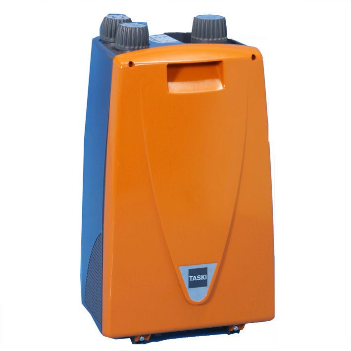 A TASKI ERGODISC FLEXX habképző 36V a Diversey Deutschland GmbH & Co. OHG-tól egy függőleges, narancs-kék, téglalap alakú tisztítógép alkatrész, két szürke számlappal, egy elülső fogantyúval és egy kis TASKI logóval az alján.