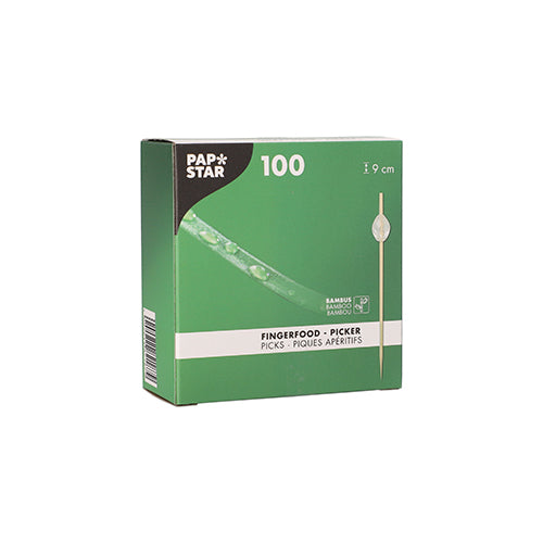 Eine grüne Schachtel der PAPSTAR GmbH mit der Aufschrift "PAPSTAR 100 Fingerfood - Picker" enthält 100 Bambuspickel mit einer Länge von je 9 cm. Die Verpackung zeigt ein Bild des Lebensmittelpickers und Produktinformationen in mehreren Sprachen.