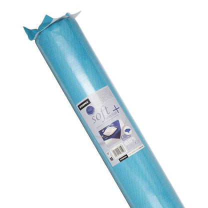 Egy feltekert kék Starpak asztalterítő, szövetre emlékeztető, "soft selection plus" vlies, műanyag csomagolásban, címkével, amely termékadatokat és matracábrázolásokat tartalmaz, amelyek tartós, szövetre emlékeztető minőségre utalnak.