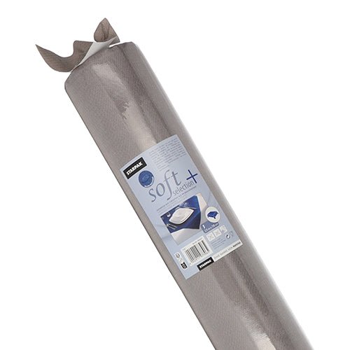 Egy tekercs szürke, csúszásmentes Starpak asztalterítő, szövethez hasonló "soft selection plus" vlies részben letekerve látható, Starpak márkájú termékcímkével és a "soft selection plus" sorozatnévvel.