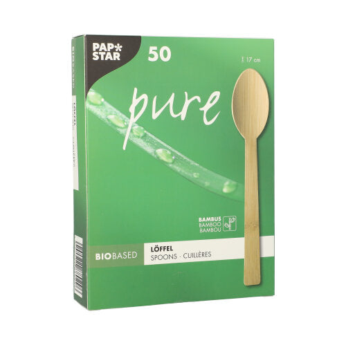 Die grüne PAPSTAR „pure“-Box enthält 50 Bambuslöffel (17 cm), ist mit den Aufschriften „BIOBASED“, „BAMBUS BAMBOU BAMBU“ und „biologisch abbaubar“ versehen und trägt auf der Vorderseite ein Bambuslöffel-Bild. Marke: PAPSTAR GmbH.