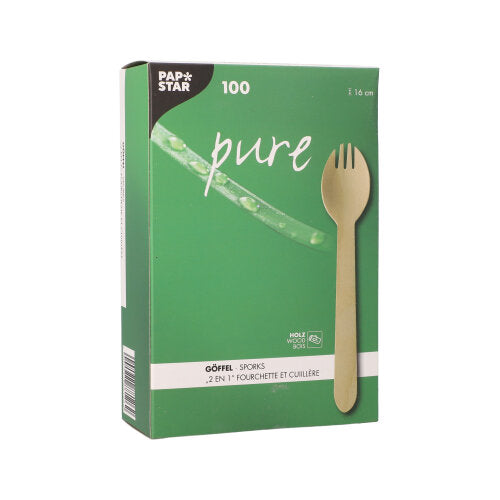 Egy zöld doboz a PAPSTAR GmbH-tól, "pure" felirattal, 100 környezetbarát fa-gőffelt (16 cm) tartalmaz egy kartontálcában, többnyelvű márkajelzéssel és termékinformációkkal, és fenntartható alternatívát kínál a hagyományos eszközökkel szemben.