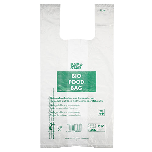 A PAPSTAR GmbH 100 darab ingvállas hordtáskája átlátszó, biológiailag lebomló biofólia csomózsák, amely egy tekercsben zöld „PAP STAR BIO FOOD BAG” szöveggel és többnyelvű információkkal a komposztálhatóságról és a megújuló nyersanyagokról.