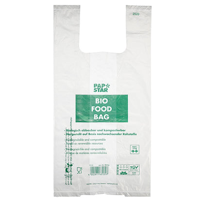 A PAPSTAR GmbH 100 darab ingvállas hordtáskája átlátszó, biológiailag lebomló biofólia csomózsák, amely egy tekercsben zöld „PAP STAR BIO FOOD BAG” szöveggel és többnyelvű információkkal a komposztálhatóságról és a megújuló nyersanyagokról.