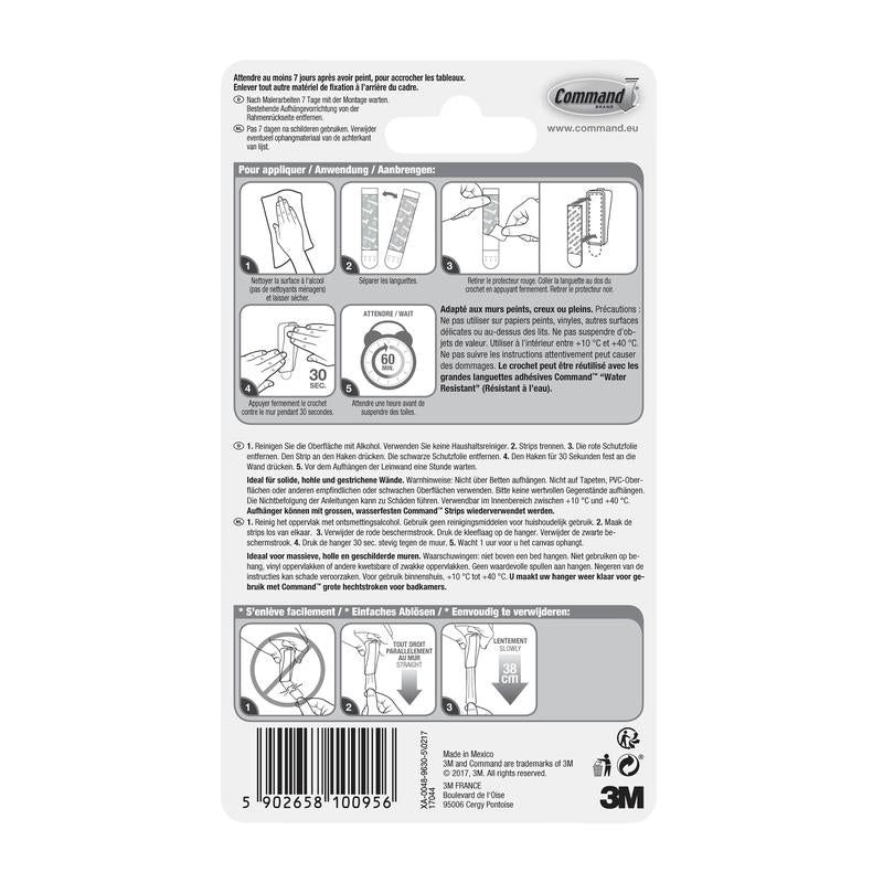 A 3M Deutschland GmbH Command™ vászonakasztó-csomagolás hátoldala képes alkalmazási/eltávolítási útmutatót tartalmaz négy nyelven, egy vonalkódot az alsó részen, gyártói adatokat és a 3M logót.