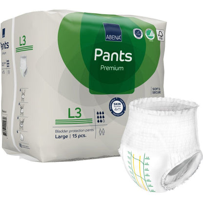 Egy csomag ABENA Pants Premium L az Abena Re-Seller GmbH-tól, nagy méret, 15 húgyhólyagvédő nadrágot tartalmaz. Egy pelenka látható a fehér-zöld csomagoláson kívül, amely termékinformációkat, szivárgás elleni védelem szimbólumokat és márkajelzést mutat.
