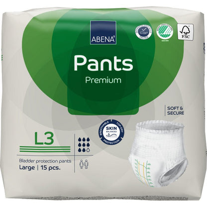 Egy 15 darabos ABENA Pants Premium L csomag az Abena Re-Seller GmbH-tól, zöld-fehér csomagolásban szivárgás elleni védelemmel, termékinformációval és egy nadrág képével az elején.