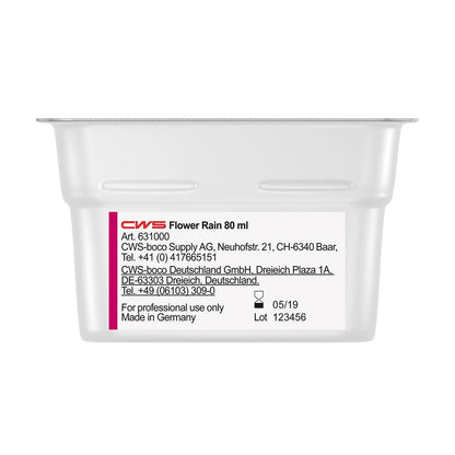 Egy téglalap alakú 80 ml-es CWS ParadiseLine mosdóillat illatosító adagolóhoz Paradise Air Bar, amelyen a "CWS Flower Rain" felirat szerepel, termék-, cég- és kapcsolati információkkal, valamint használati utasítással. Németországban készült. Érvényes: 05/19. Tétel: 123456. Ideális mosdóillatként.