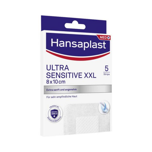 Schachtel mit Hansaplast Sensitive XXL Pflasterstrips der Beiersdorf AG, enthält 5 sterile Wundverbandstreifen in einer Schachtel, Größe 8x10 cm, beschriftet in weiß und blau.