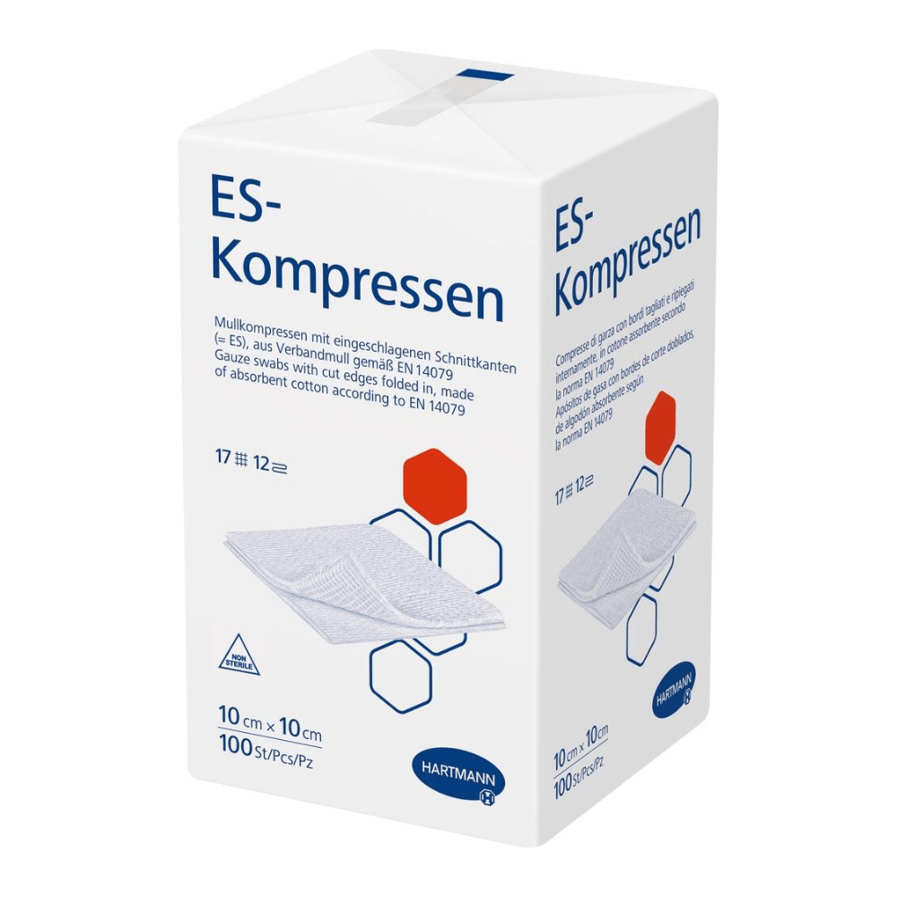Egy doboz Hartmann ES-kompressz a Paul Hartmann AG papírzacskójában, orvosi gézkompressziók sebkezeléshez, a termék ábráival és német nyelvű szöveggel, méret- és mennyiségmegadásokkal.