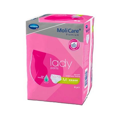 Egy csomag Hartmann MoliCare® Premium lady pants inkontinencia nadrág Paul Hartmann AG közepes méretben, 8 darabbal. A csomagolás rózsaszín és fehér, a „diszkrét érzés és bőrbarát“ jelzéssel ellátva, ami a termék viselési kényelmét hangsúlyozza.