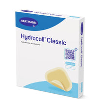 Eine Dose Hartmann Hydrocoll Classic Verband steril, einzeln eingesiegelt von der Paul Hartmann AG – ideal für feuchte Wundbehandlung, unterstützende Granulation und Epithelisierung. Enthält 10 sterile 10 x 10 cm große Verbände in überwiegend weißer Verpackung mit blauen Akzenten.