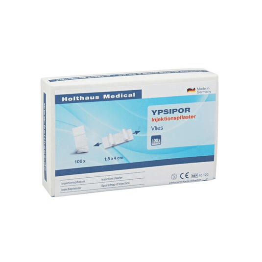A kiállított termék egy doboz Holthaus Ypsipor injekciós tapasz a Holthaus Medical GmbH & Co. KG gyártmányában. A túlnyomórészt fehér, kék díszítésű csomagolás 100 darab, 1,5x4 cm méretű tapaszt tartalmaz. A dobozon német nyelvű szöveg és a tapaszok képe látható.