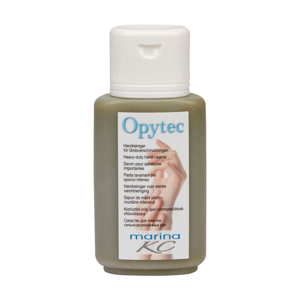 Egy műanyag palack a Johannes Kiehl KG-tól fehér kupakkal és "Kiehl Opytec kéztisztító durva szennyeződésekhez" felirattal, amely többnyelvű "marina KC" címkét visel világos alapon.