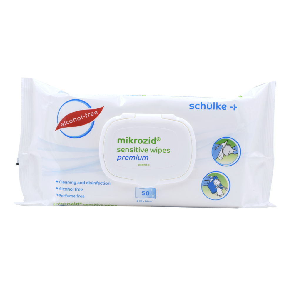 Egy csomag Mikrozid® sensitive Wipes Jumbo a Schülke & Mayr GmbH-tól. A fehér csomag 50 alkohol- és parfümmentes kendőt tartalmaz, felnyitható fedéllel bemutatva. Ikonok szemléltetik az érzékeny bőrre való alkalmazást.
