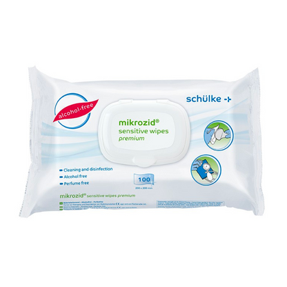 Egy csomag Schülke Mikrozid® sensitive wipes Jumbo fertőtlenítő kendő a Schülke & Mayr GmbH-tól, fehér visszazárható műanyag csomagolásban, kék és zöld szöveggel és szimbólumokkal az alkohol- és parfümmentes tulajdonságokhoz, tartalmaz