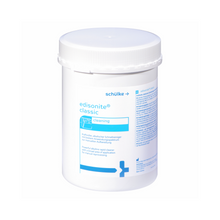 Ein weißer 1kg-Behälter der Schülke & Mayr GmbH mit der Aufschrift "Auslaufartikel: Schülke Instrumentenreinigung edisonite classic" mit blauer Schrift und Grafik, mit Schraubverschluss; ideal als manueller Pulverreiniger für Laborgeräte, Angaben in mehreren Sprachen auf dem Etikett.