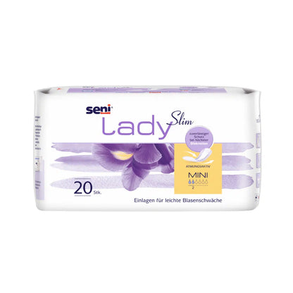 Egy 20 darabos Seni Lady Slim Mini a20 csomag a TZMO Deutschland GmbH-tól lila írisz dizájnnal és német szöveggel könnyű védelmet nyújt hólyaggyengeség esetén Extra Dry Systemmel a légáteresztés és nedvszívó képesség érdekében.
